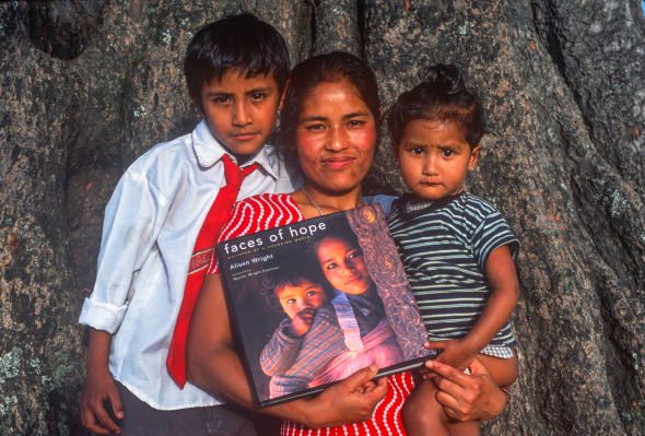  Sihaile (25) with her children, and on the cover of "Faces of Hope."