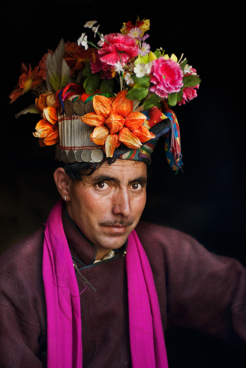 Ladakh, India 2006 . Man wearing flowers, Dha-Hanu, Ladakh, India, 2006